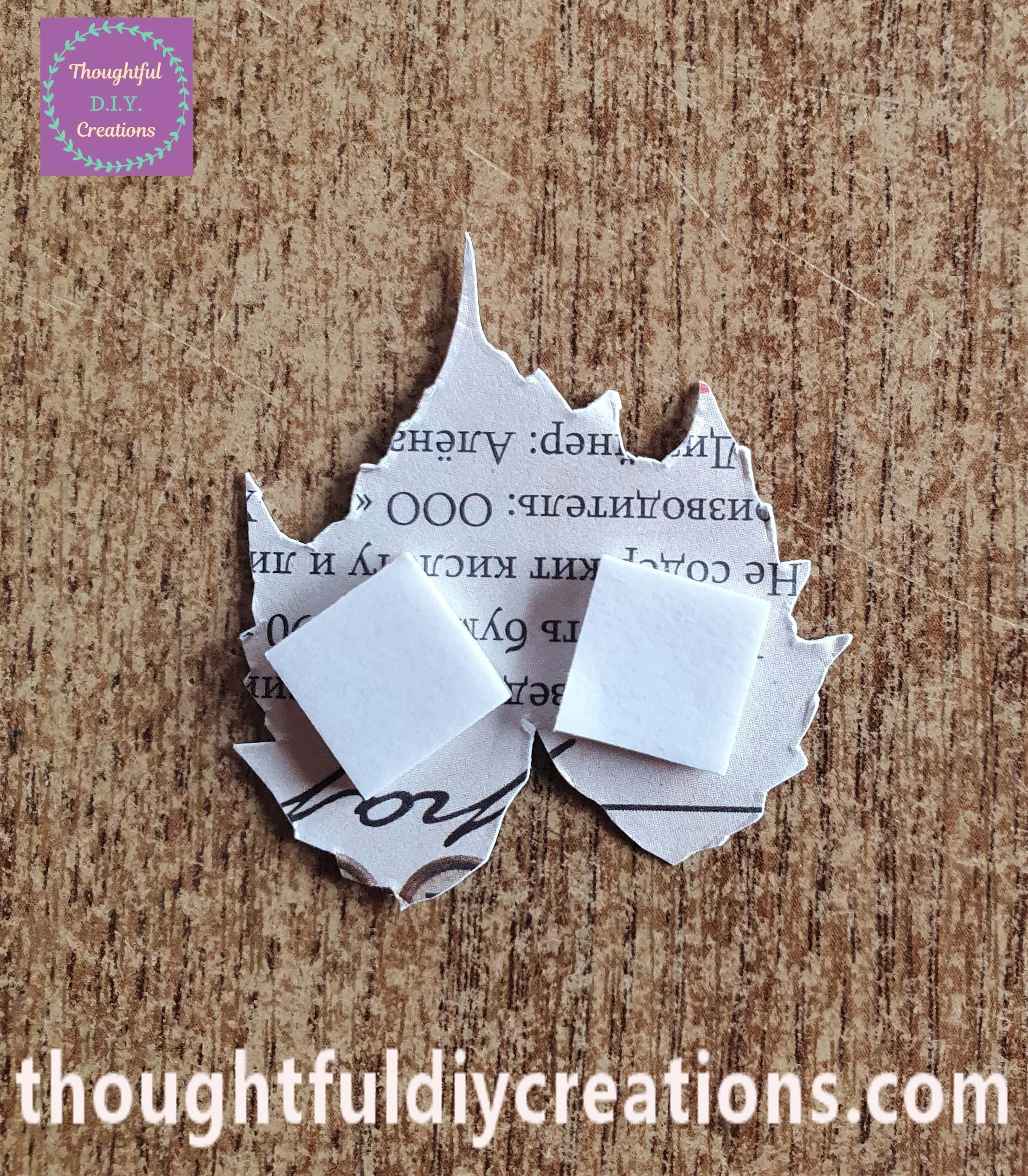 I put 2 foam squares on the back bottom part of a leaf.