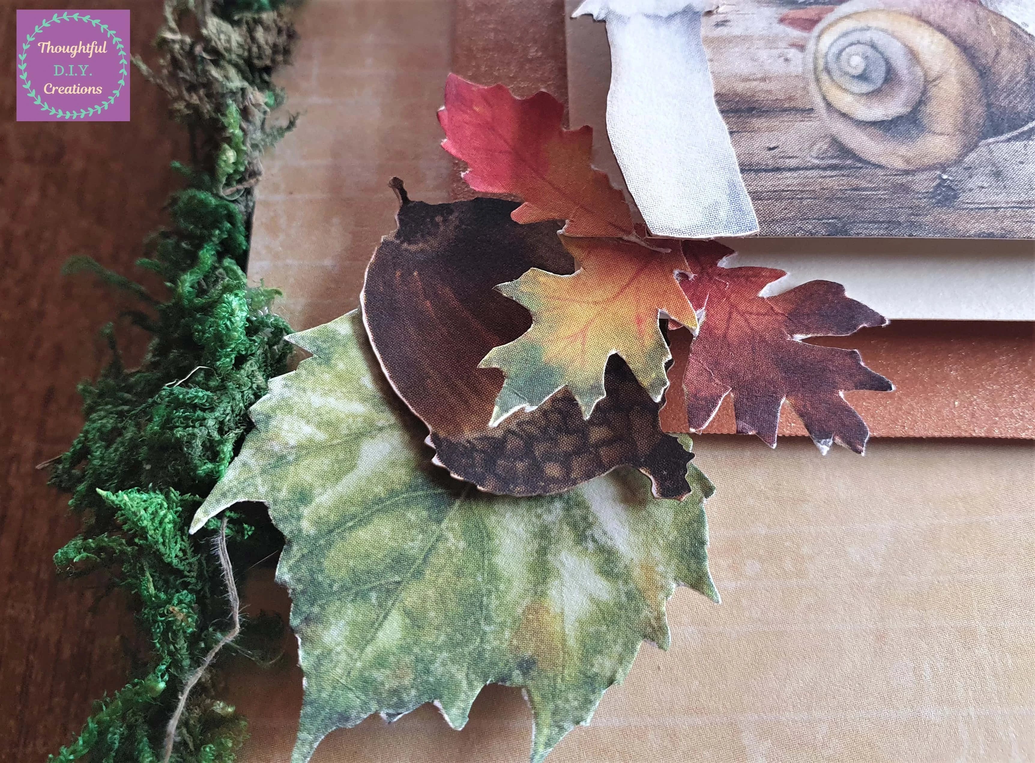 I used Pritt Stick on 3 Colourful Leaves and attached them over the Acorn.