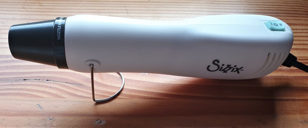 I pluggedin my Heat Tool for Embossing.