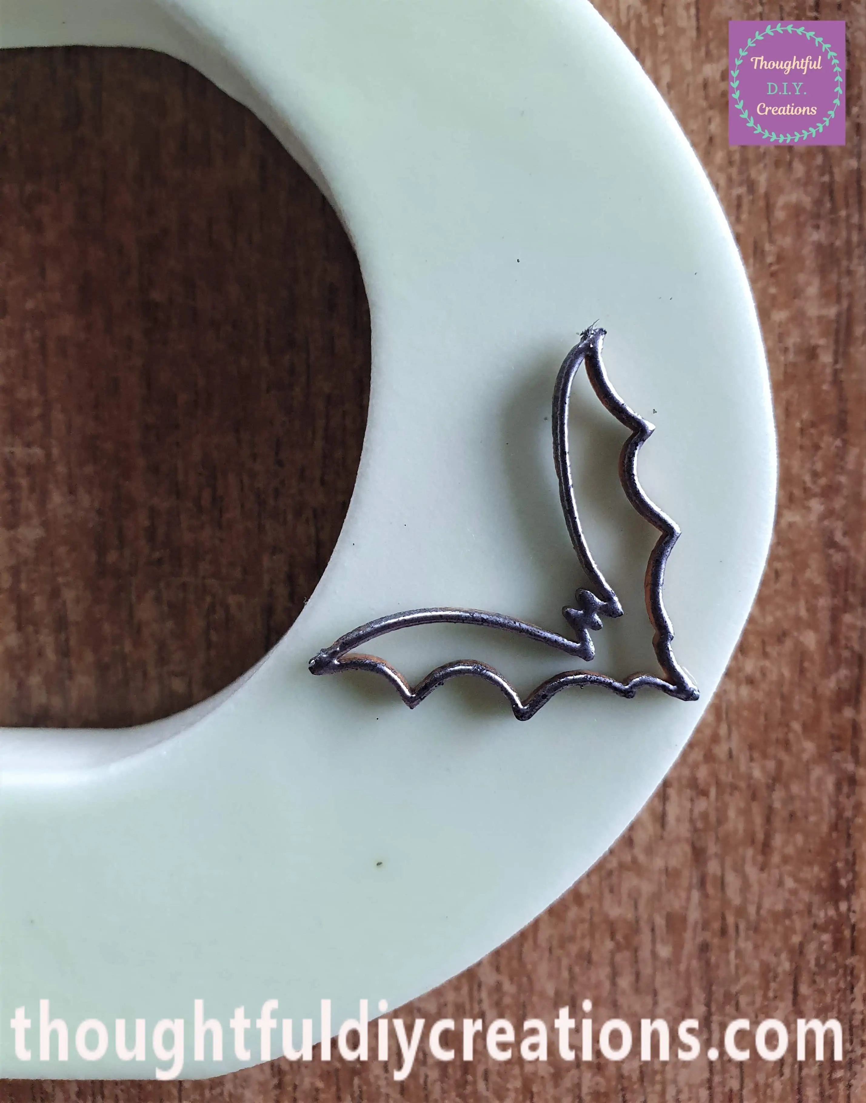 I attached it to the bottom half of the Letter 'B' with Tacky PVA Glue.