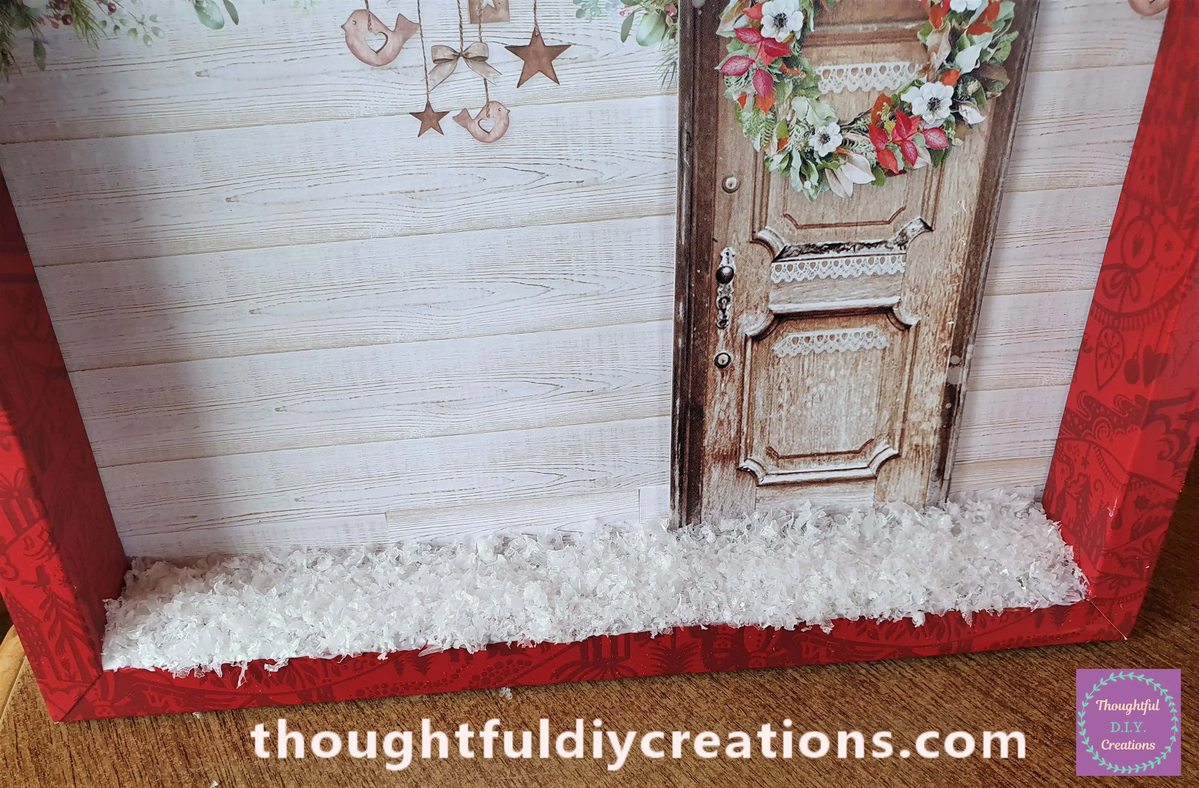 I continued doing a small portion at a time until the bottom of the Christmas Shadow Box was filled with Snow.