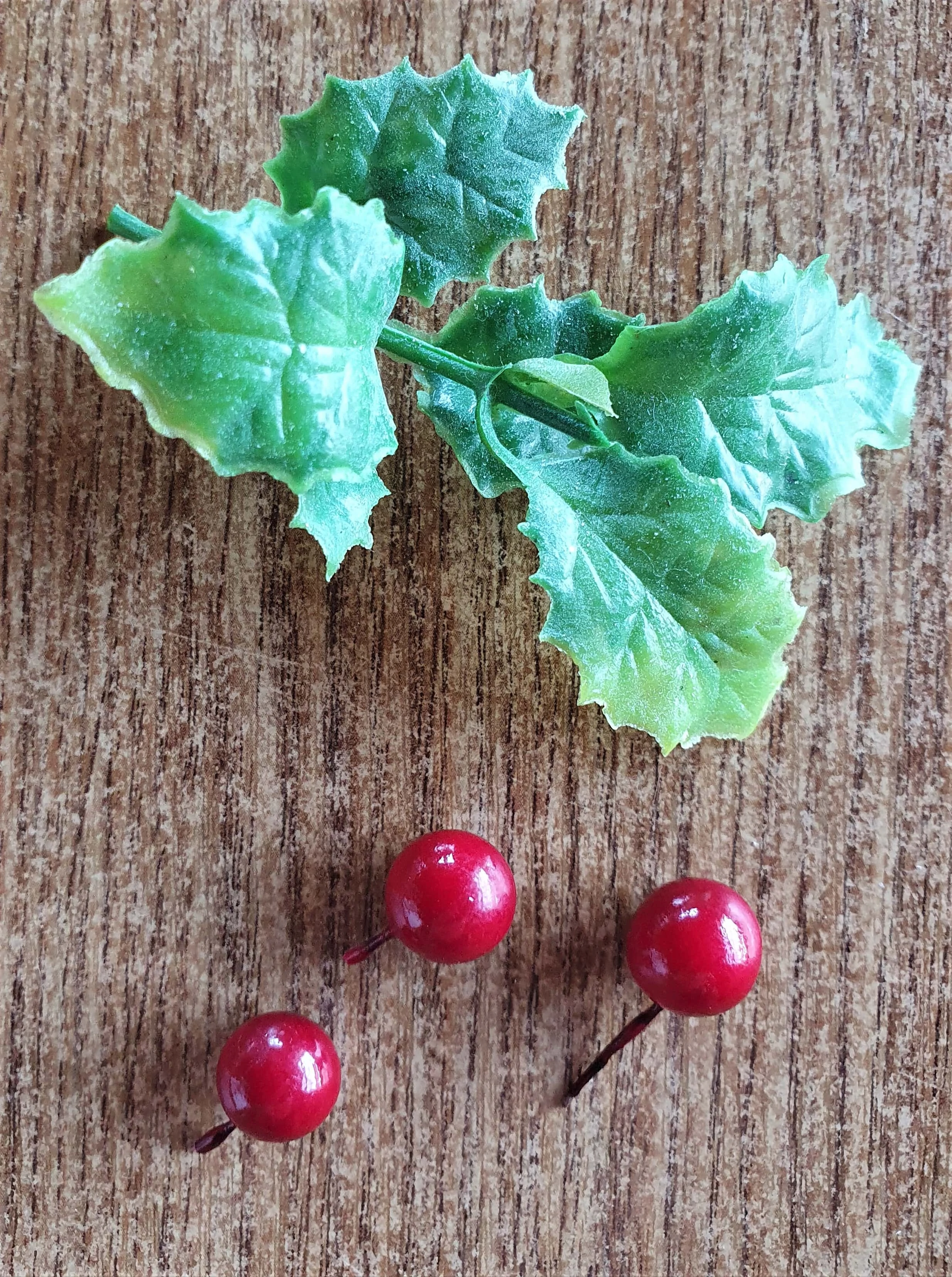 I found faux leaves and cut off 3 berries individually from a bunch.