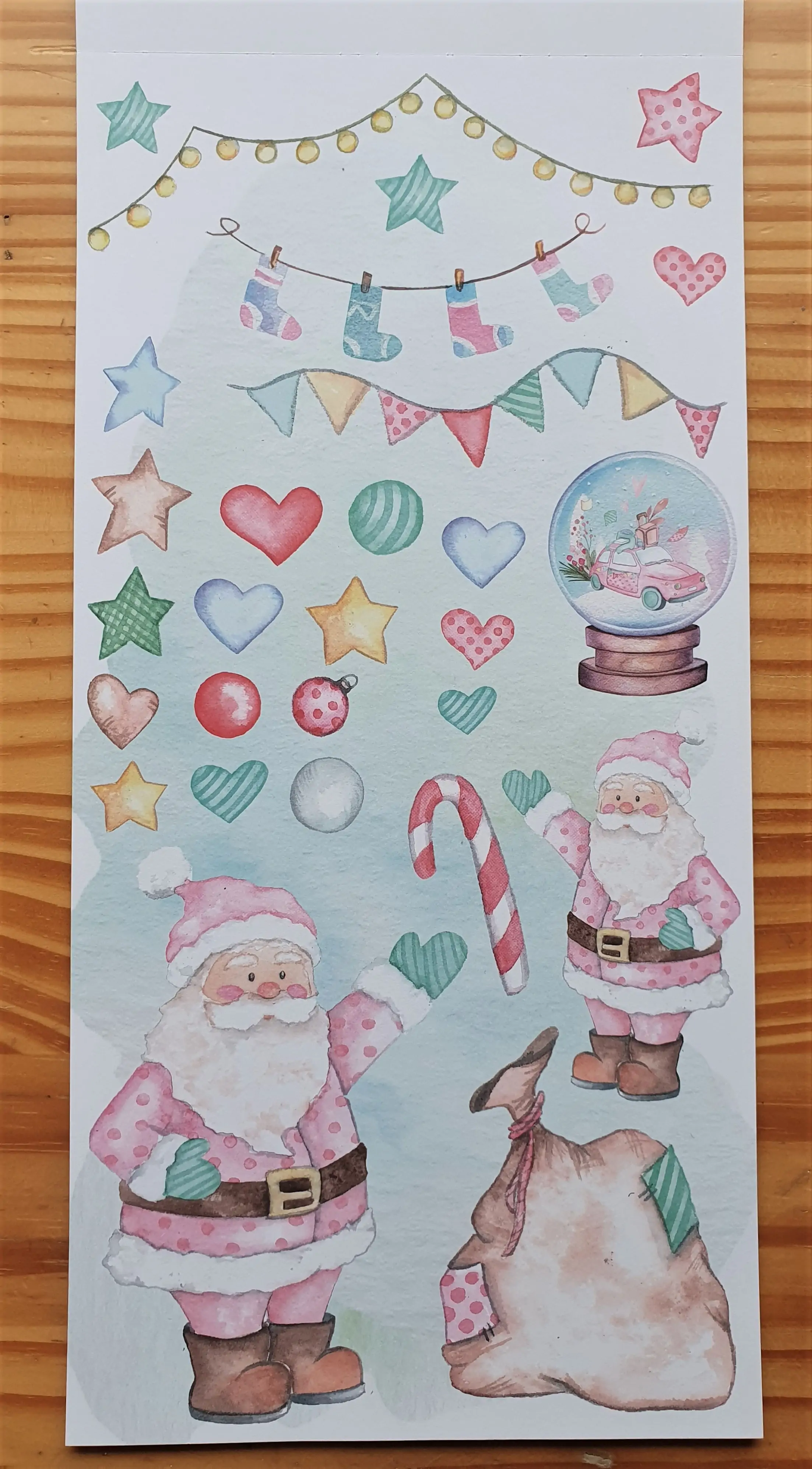 I will be cutting out the smaller Santa from this Page.