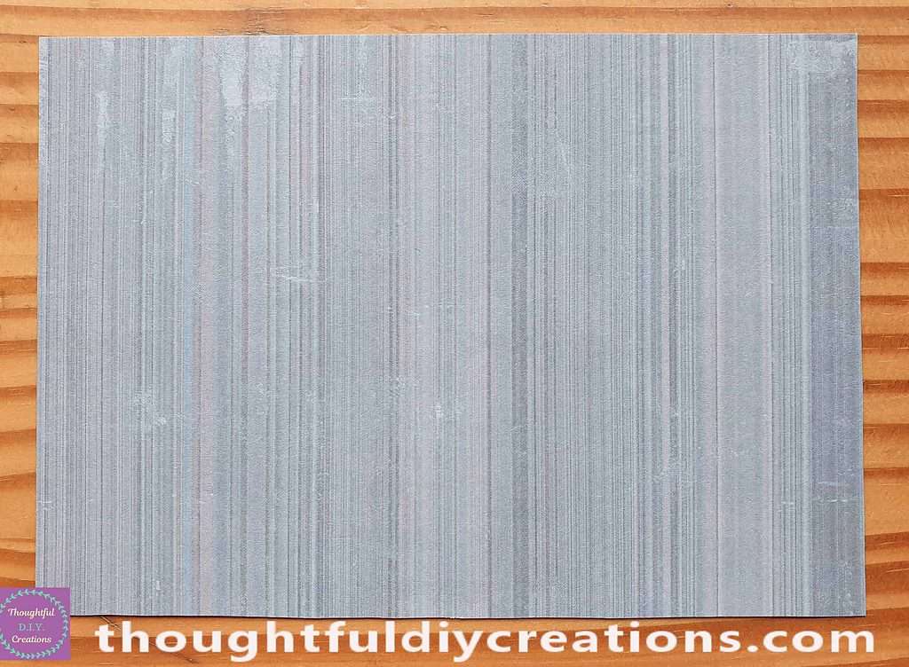 I Cut it out slightly smaller thsan the Ivory Card.