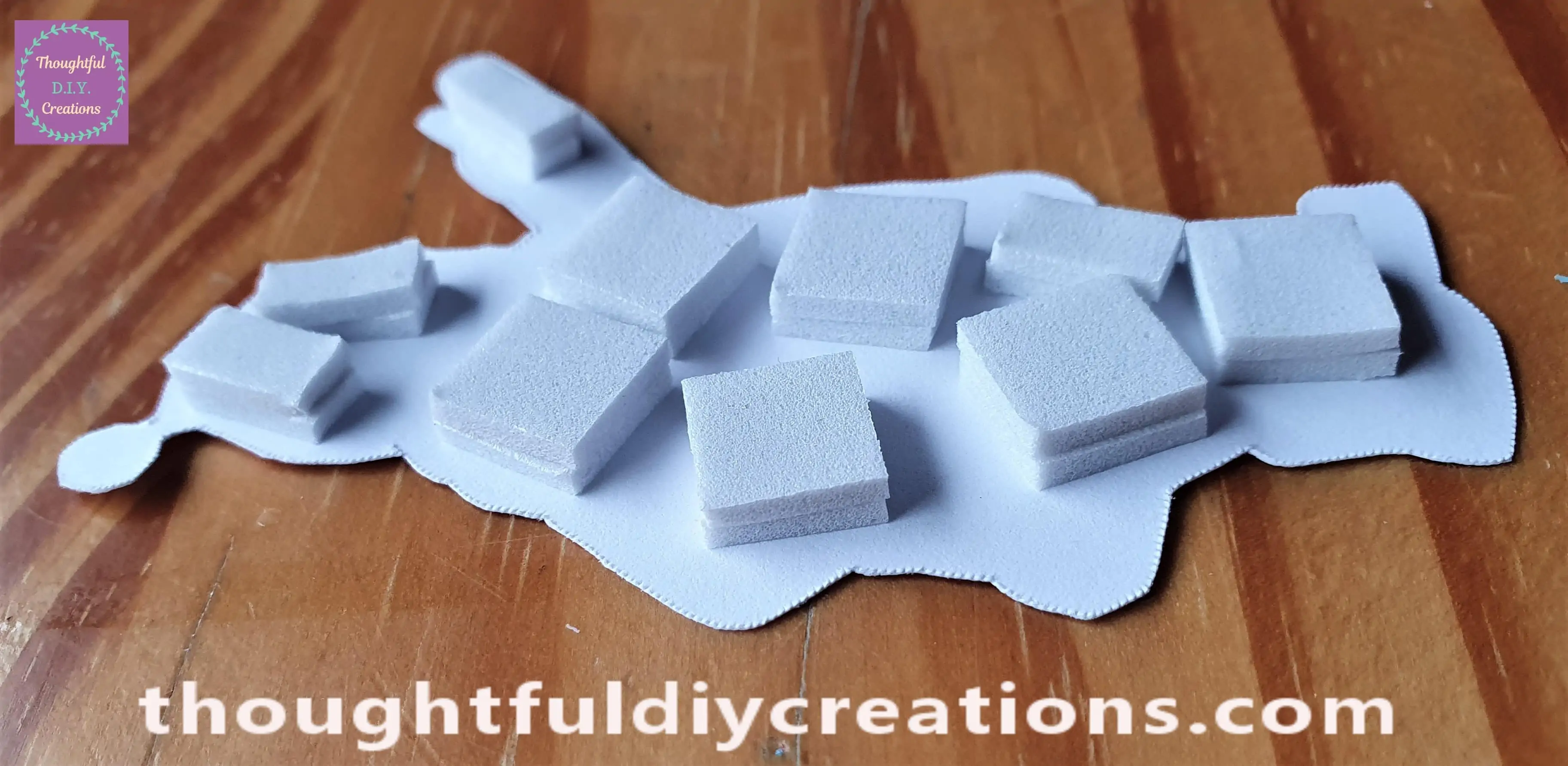 I put 2 layers of the Foam Squares on the back of the Santa to give extra dimension to the Christmas Card.