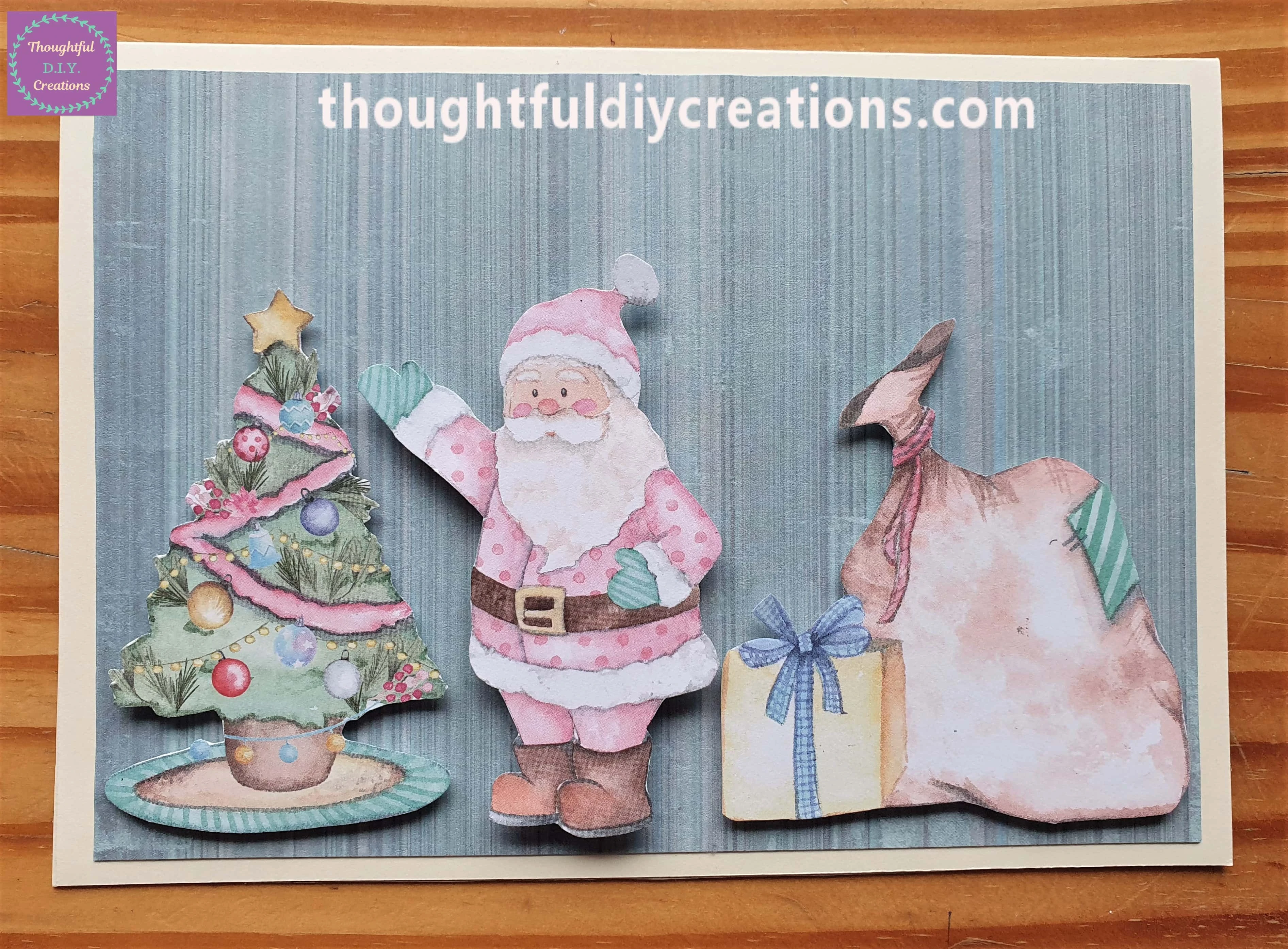 I attached him to the Christmas Card in between the Tree and Sack.